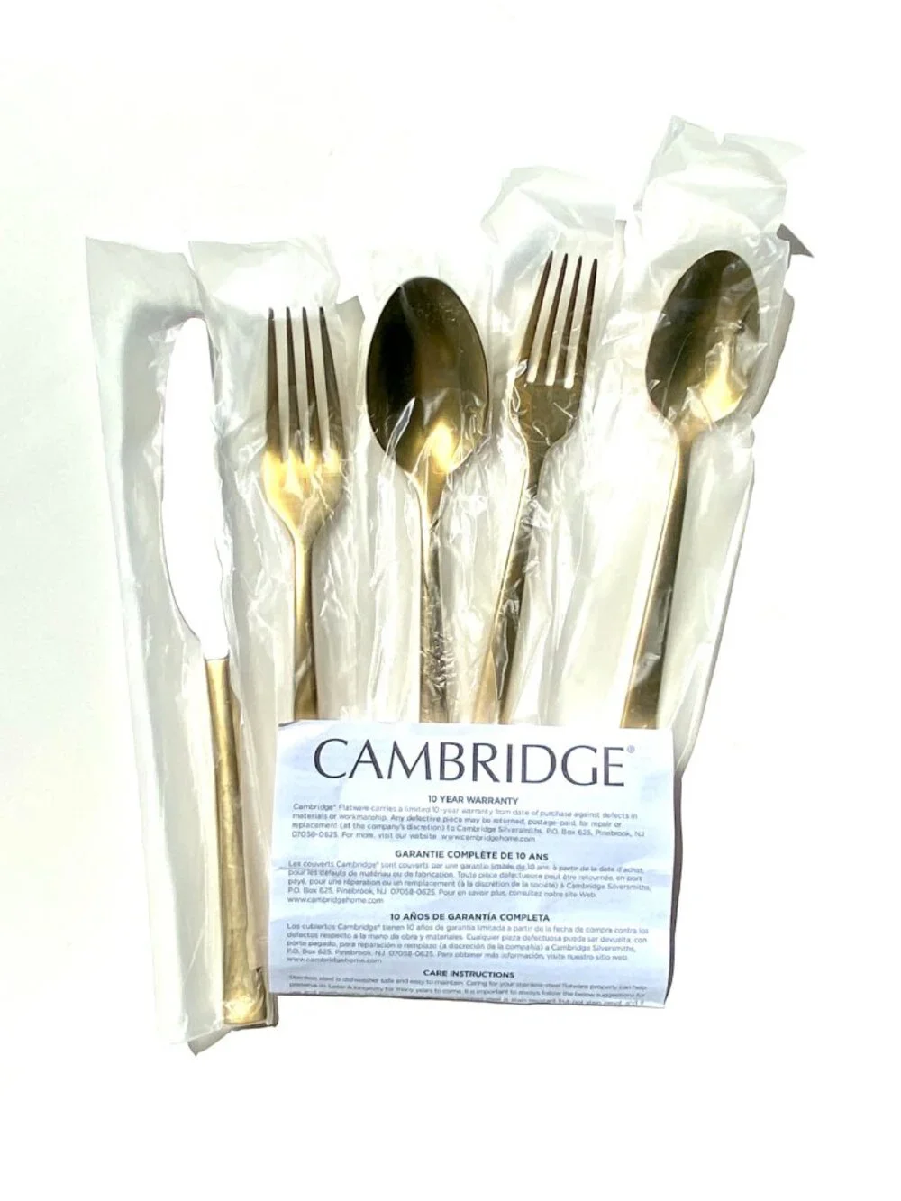 Crate&Barrel gold flatware “Ellenore” by Cambridge. 4 place settings, NIB.